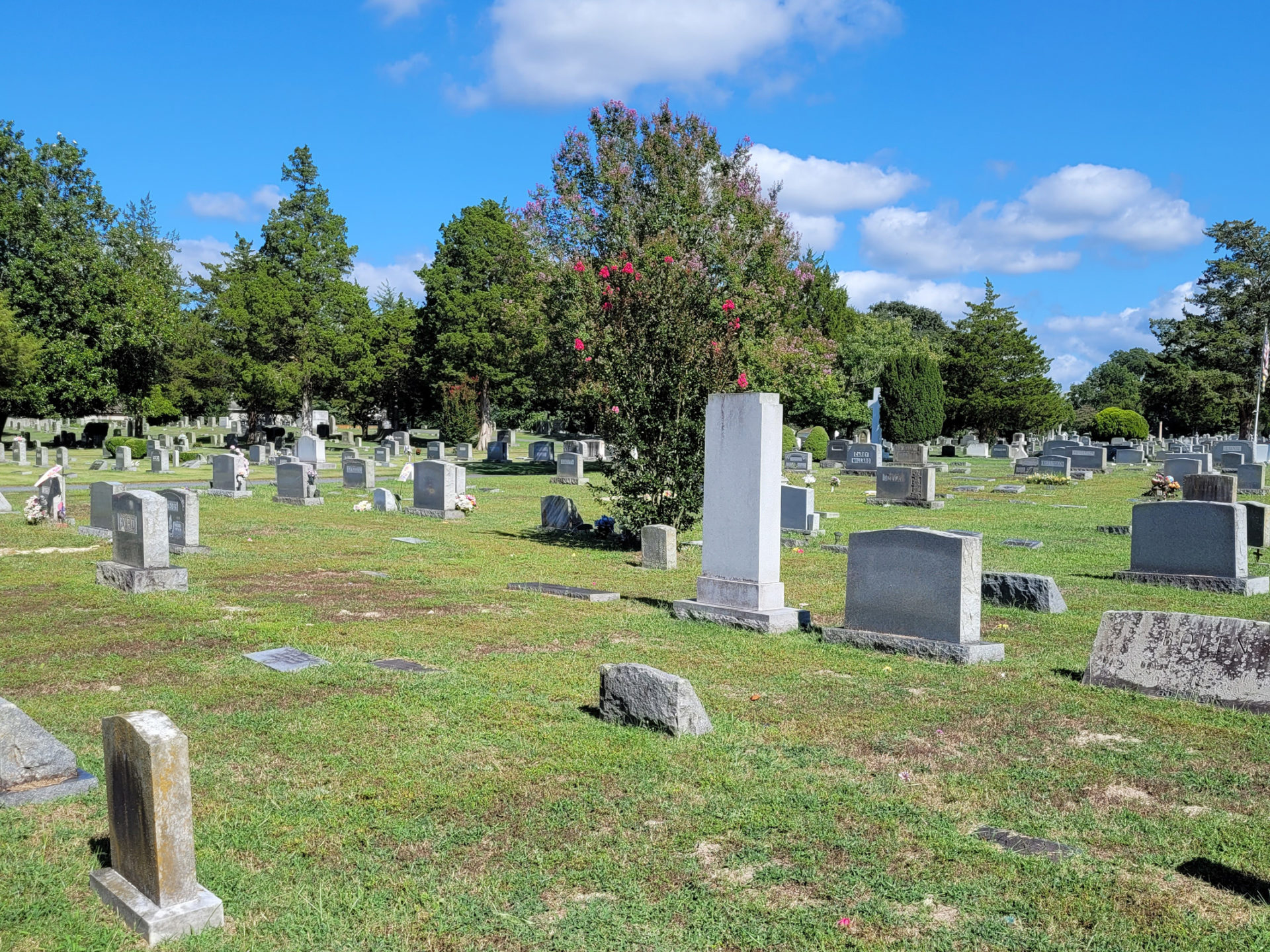 Various shapes and sizes of headstones at the Parsons Cemetery